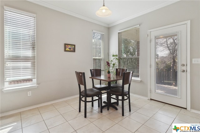 tiled dining area with crown molding