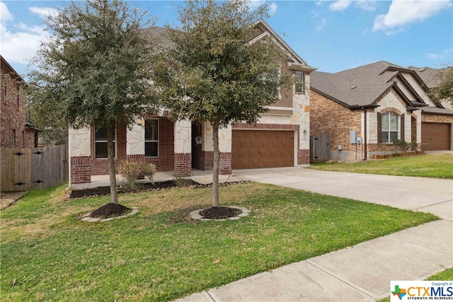 view of front of home with a front lawn and a garage