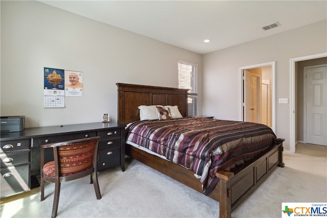 bedroom with light carpet