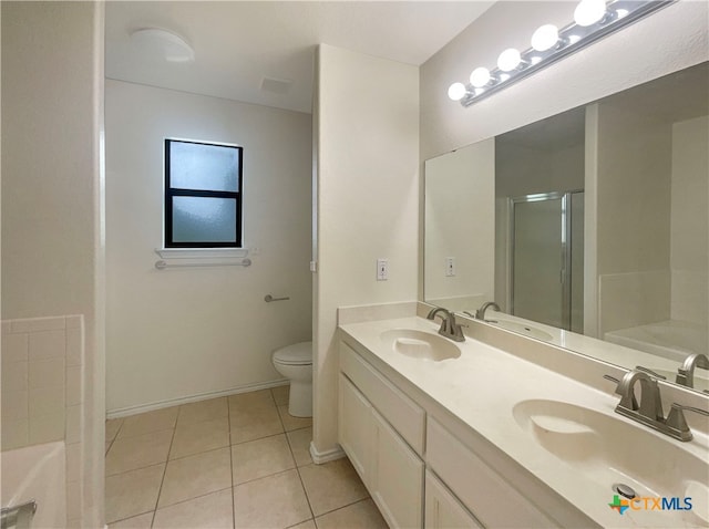 full bathroom with toilet, plus walk in shower, vanity, and tile patterned floors