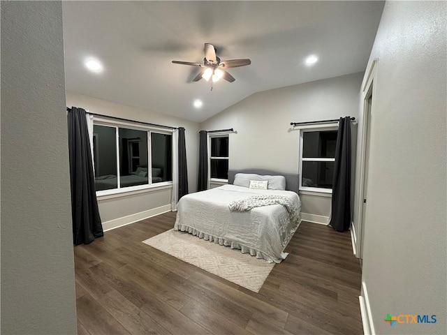 bedroom with vaulted ceiling, a ceiling fan, wood finished floors, baseboards, and recessed lighting