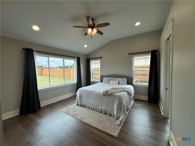 bedroom featuring dark wood-type flooring, recessed lighting, vaulted ceiling, and baseboards