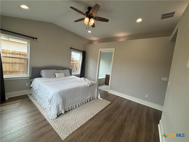 bedroom with dark wood-style floors, recessed lighting, visible vents, vaulted ceiling, and baseboards