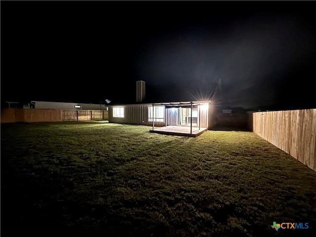 exterior space featuring a fenced backyard