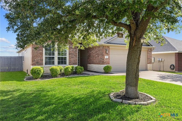 7915 Redbrush, Temple, TX 76502 - view of property hidden behind natural elements with brick siding, driveway, a garage, and stone siding