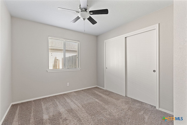7915 Redbrush, Temple, TX 76502 - unfurnished bedroom with carpet flooring, a closet, and ceiling fan