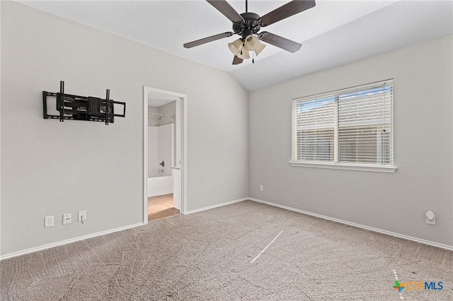 7915 Redbrush, Temple, TX 76502 - unfurnished room featuring carpet flooring, a ceiling fan, and vaulted ceiling
