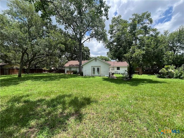 306 Angus St, Victoria, TX 77904 - view of yard with french doors