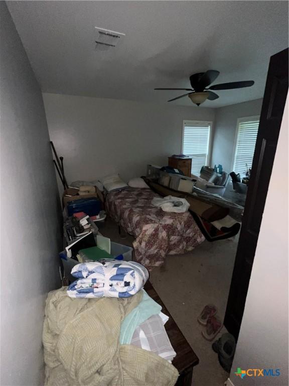 306 Angus St, Victoria, TX 77904 - bedroom with carpet flooring and ceiling fan