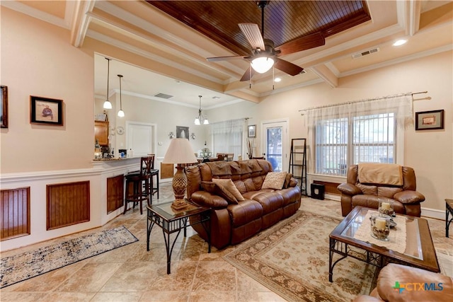 living area featuring visible vents, a ceiling fan, crown molding, and beam ceiling