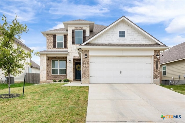 view of front of house featuring central AC unit, a front yard, and a garage