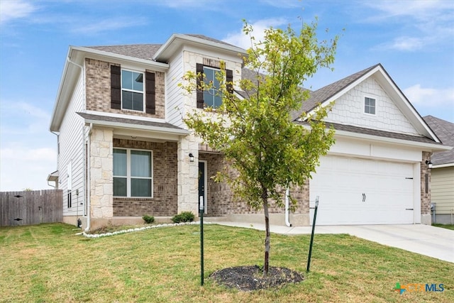 craftsman-style home with a garage and a front lawn