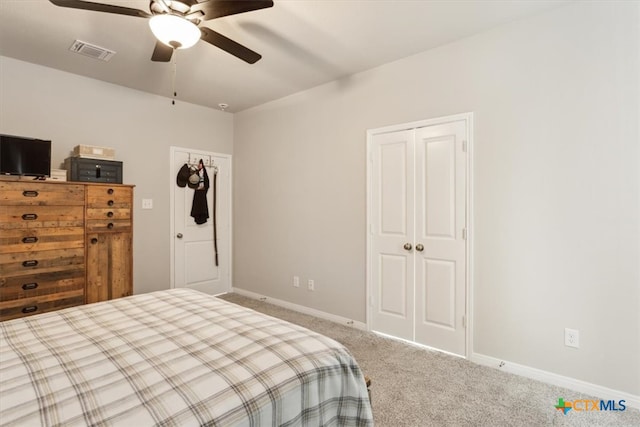 carpeted bedroom with ceiling fan