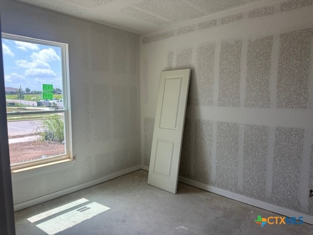 3718 Oglala Trl, Temple, TX 76502 - unfurnished room featuring concrete floors