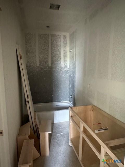 3718 Oglala Trl, Temple, TX 76502 - bathroom with concrete floors and a tub to relax in
