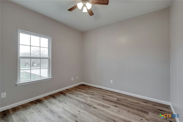 1408 Armstrong St, Luling, TX 78648 - empty room featuring light wood-style floors and ceiling fan