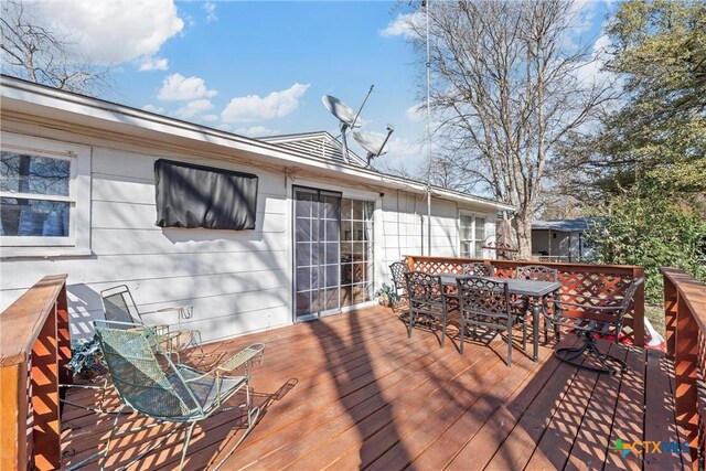 1016 E Elm St, Hillsboro, TX 76645 - wooden terrace featuring outdoor dining space