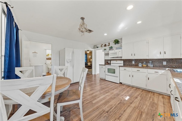 1016 E Elm St, Hillsboro, TX 76645 - kitchen with light wood-type flooring, tasteful backsplash, white cabinetry, recessed lighting, and white appliances