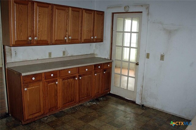 108 Sorrel St, Red Rock, TX 78662 - kitchen featuring brown cabinetry and light countertops