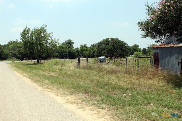 view of road featuring a rural view