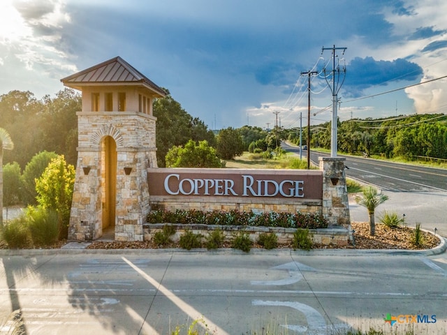 view of community sign