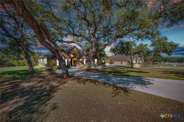 view of front of house with a lawn