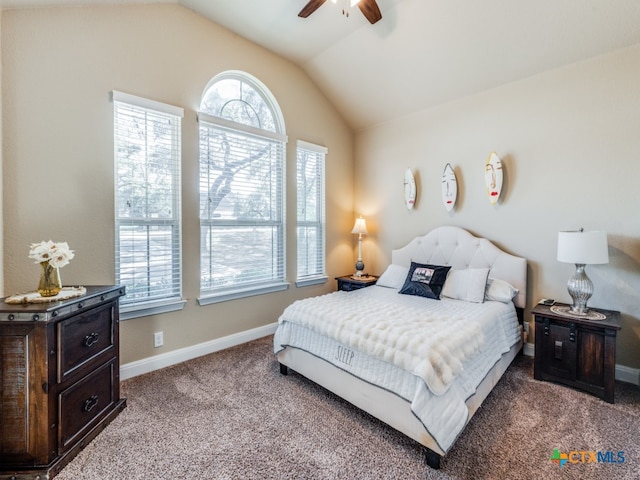 bedroom with vaulted ceiling, carpet flooring, and ceiling fan