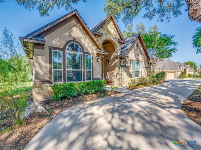 view of front of property with a garage