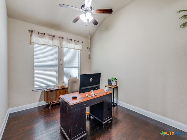 office featuring dark hardwood / wood-style flooring, lofted ceiling, and ceiling fan