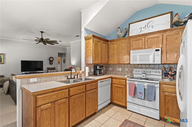 1809 Indian Camp Trl, Copperas Cove, TX 76522 - kitchen featuring white appliances, light countertops, tasteful backsplash, a peninsula, and vaulted ceiling