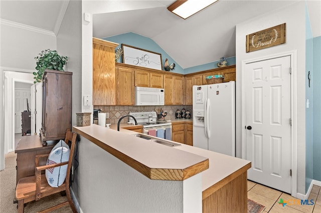 1809 Indian Camp Trl, Copperas Cove, TX 76522 - kitchen featuring white appliances, a peninsula, vaulted ceiling, decorative backsplash, and light countertops