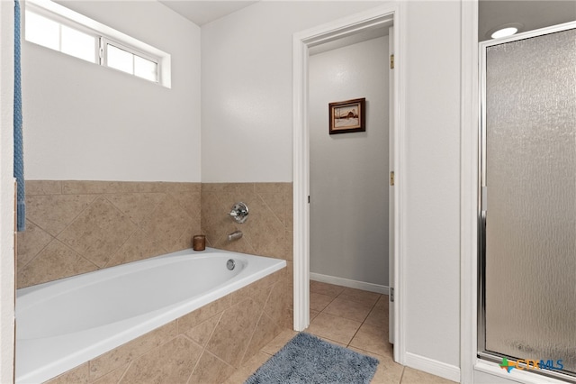 1809 Indian Camp Trl, Copperas Cove, TX 76522 - bathroom with a shower stall, a bath, and tile patterned flooring