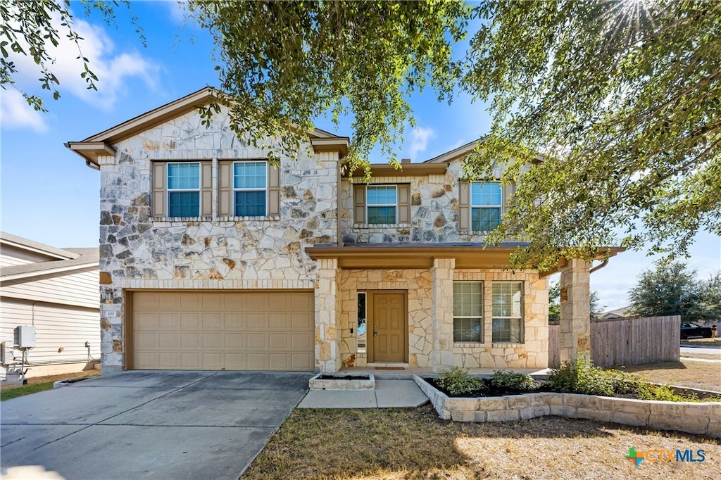 view of front of home with a garage