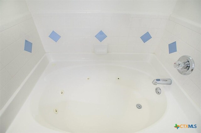 4902 Slate Ct, Killeen, TX 76542 - bathroom featuring a jetted tub