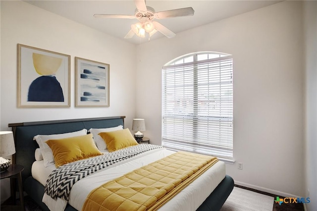 4902 Slate Ct, Killeen, TX 76542 - bedroom with baseboards, a ceiling fan, and wood finished floors