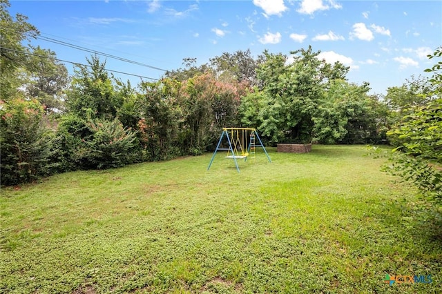 view of yard featuring a playground