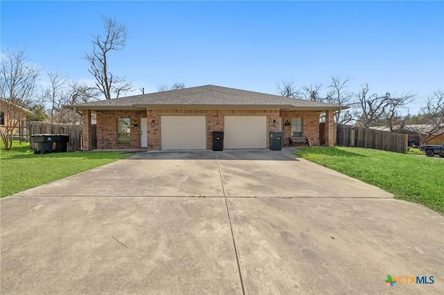 single story home with an attached garage, concrete driveway, a front yard, and fence