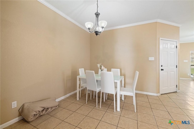 unfurnished dining area with light tile patterned floors, a notable chandelier, baseboards, and ornamental molding