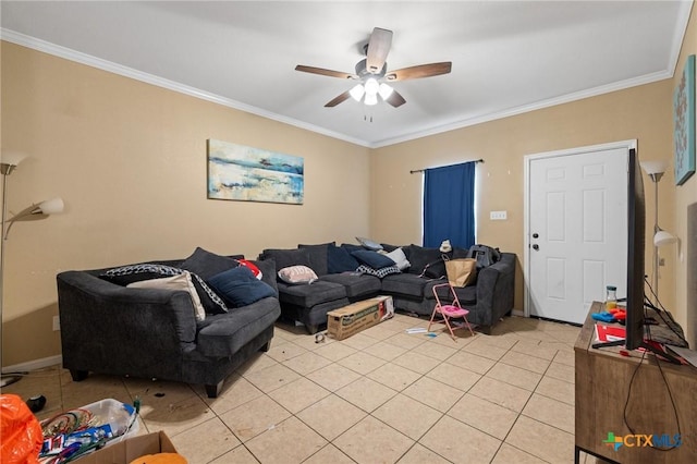 living area featuring crown molding, light tile patterned floors, a ceiling fan, and baseboards