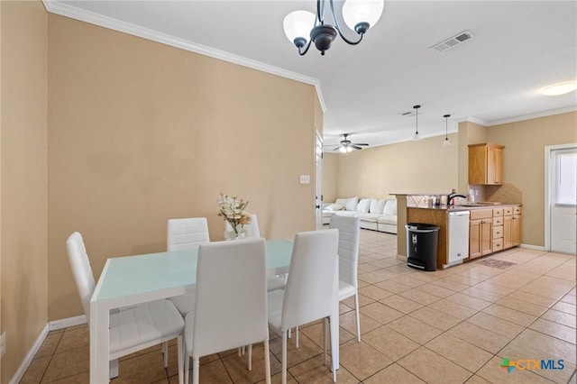 dining room featuring light tile patterned flooring, visible vents, and ornamental molding