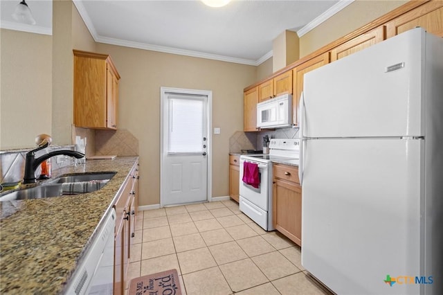 kitchen with white appliances, light tile patterned floors, ornamental molding, decorative backsplash, and a sink