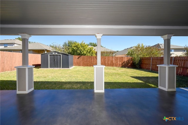 view of patio / terrace featuring a storage unit