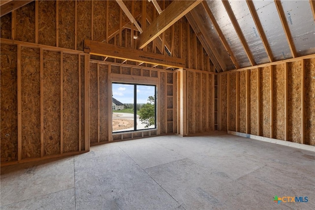 misc room with lofted ceiling