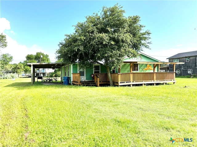 view of yard with a deck