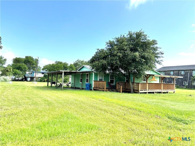 view of yard featuring a wooden deck