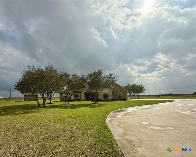 view of community with a lawn