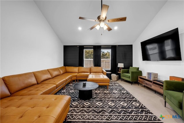 carpeted living room featuring lofted ceiling and ceiling fan