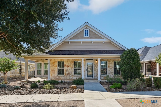 view of front of home featuring covered porch