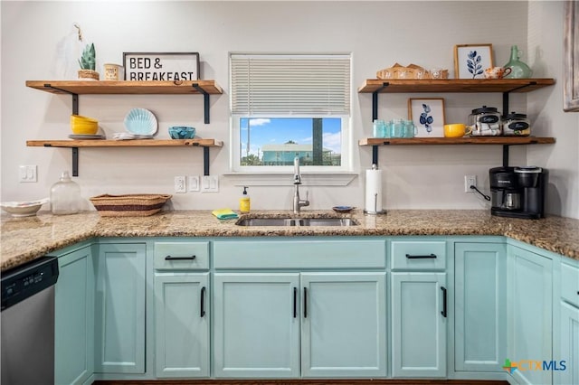 kitchen featuring open shelves, blue cabinets, dishwasher, and a sink