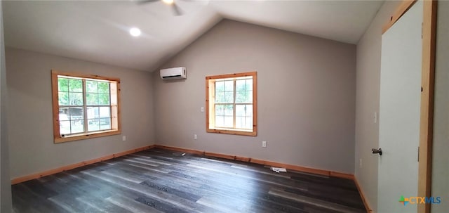 unfurnished room featuring a wealth of natural light, lofted ceiling, ceiling fan, and dark hardwood / wood-style flooring